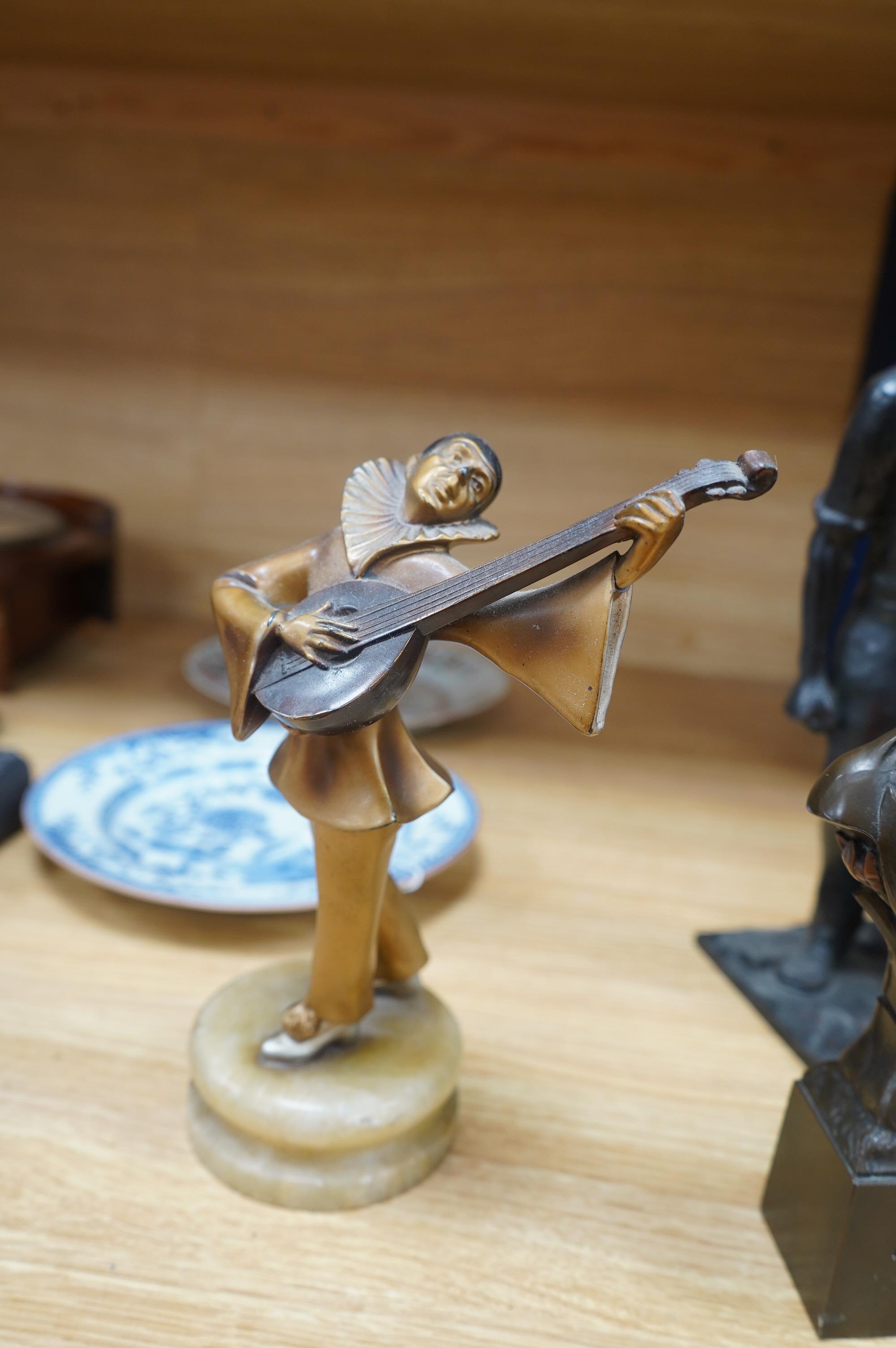 Five figural metal sculptures: a Copenhagen sculpture, signed Edvard Eriksen R.A, an Art Nouveau style bronze of a female figure stamped and dated, an enamelled figure of a musical Pierrot, another of a male figure and a